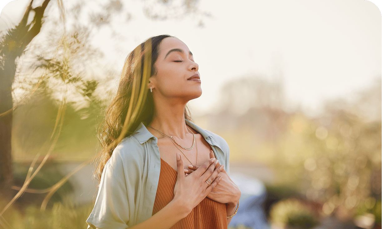 Peaceful woman enjoying nature